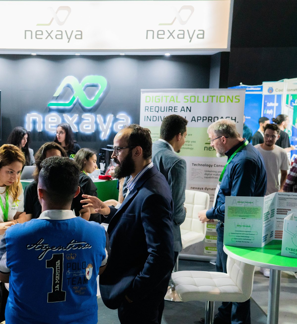 The nexaya team with visitors at our stand at a technology trade show